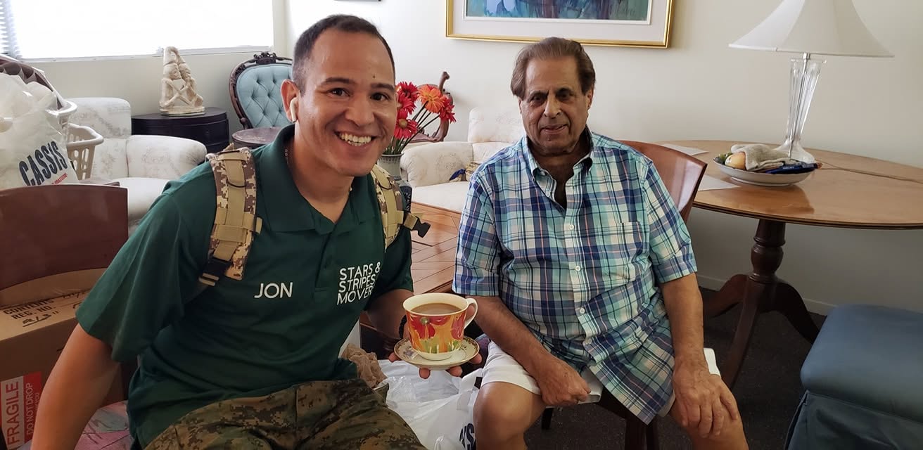 Stars and Stripes mover helping a senior customer with a delicate teacup